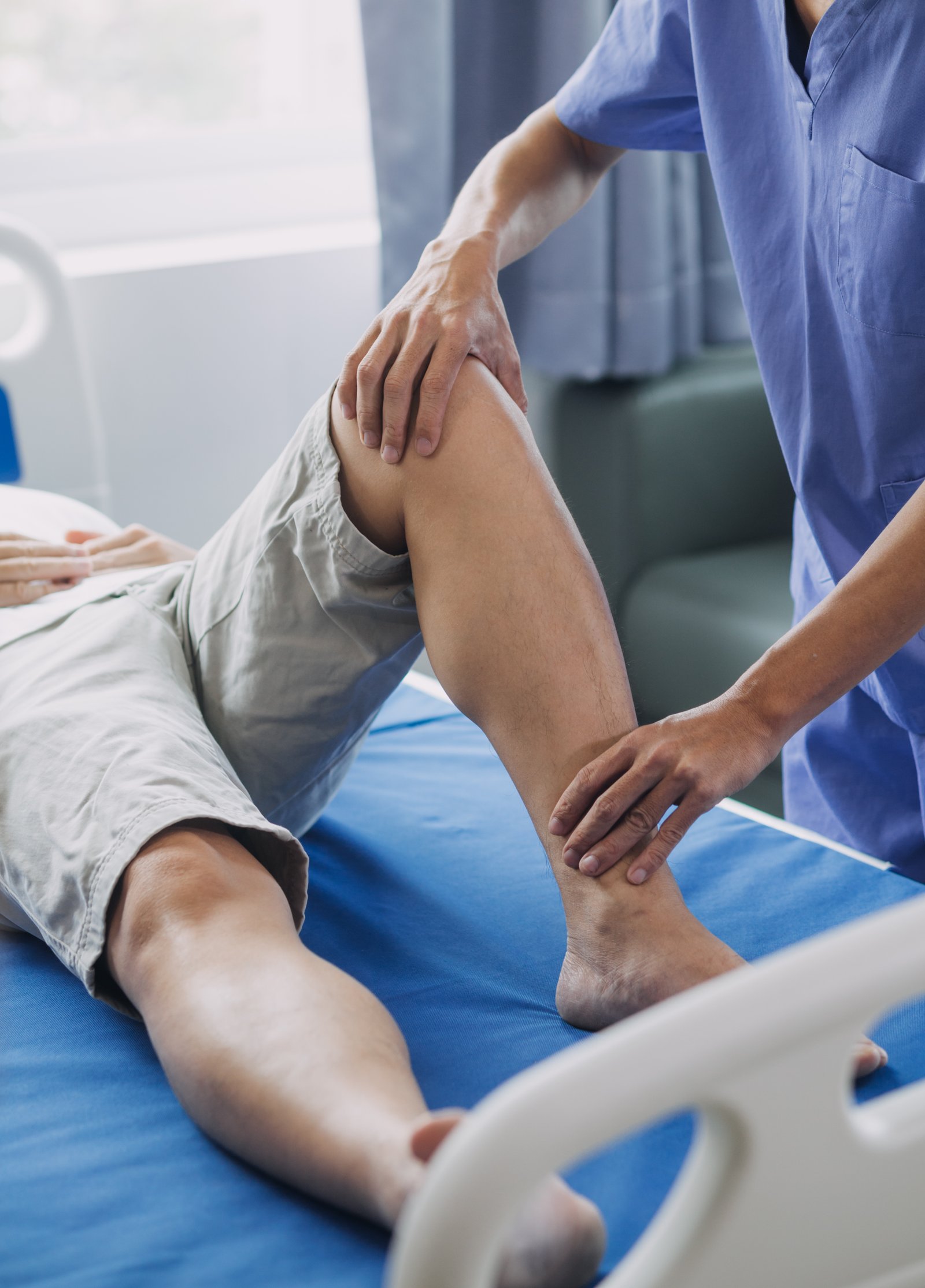 Physiotherapist providing treatment during a home visit